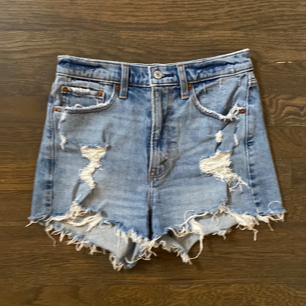 Cut off distressed denim shorts